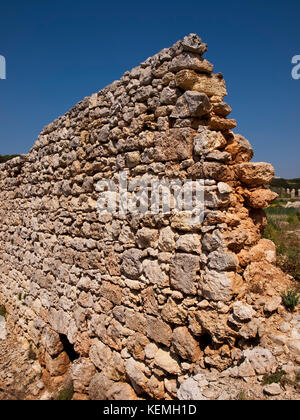 An old and neglected historic Roman wall on the island of Malta Stock Photo