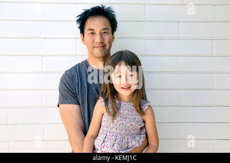 Asian father with his five year old daughter Stock Photo