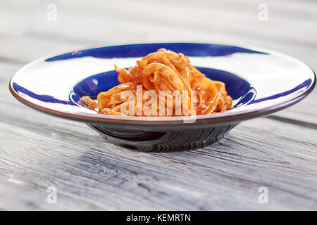 Tasty pasta frutti di maré. Appetizing italian dish on plate. Traditional italian food. Stock Photo