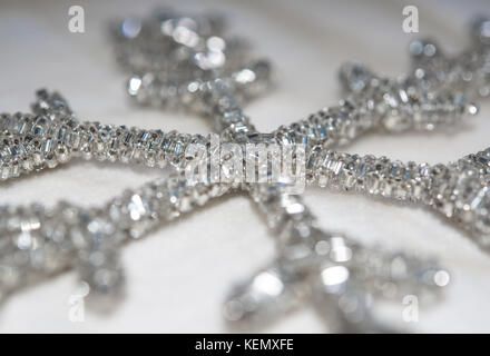 Silver beaded snowflake Christmas decoration Stock Photo