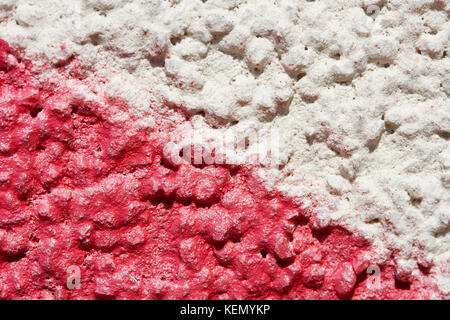 Colored industrial background. Old white-red wall. Stock Photo