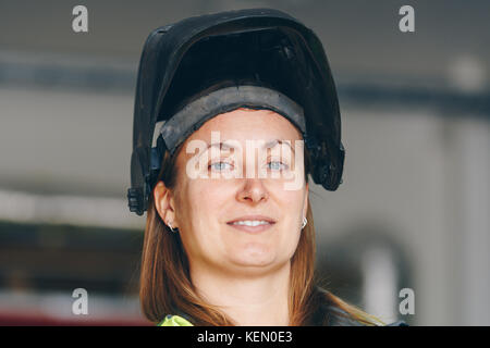Female in welders hat Stock Photo