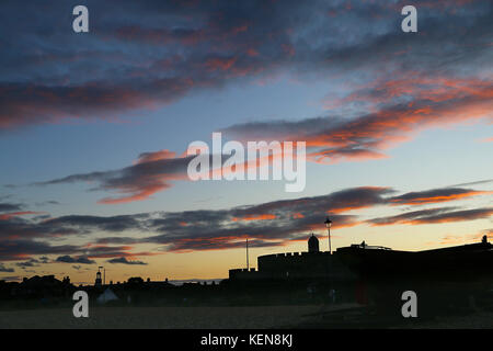 Red and Grey Deal Castle Sunset Stock Photo