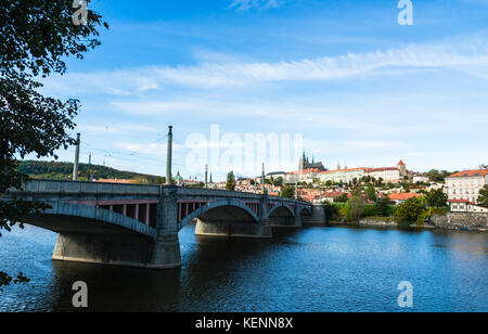 Prague, Czech Republic: The castle complex of Prague viewed from the banks of river Vltava and Manes Bridge Stock Photo