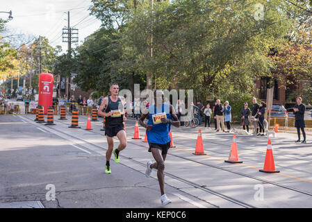 Toronto, Canada. 22nd October, 2017. Canadian marathon runner Trevor Hofbauer passing the 33km turnaround point at the 2017 Scotiabank Toronto Waterfront Marathon. He achieves the ninth place in the race. Credit: YL Images/Alamy Live News Stock Photo