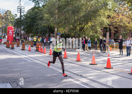 Toronto, Canada. 22nd October, 2017. Canadian marathon runner Sami Jibril passing the 33km turnaround point at the 2017 Scotiabank Toronto Waterfront Marathon. He achieves the eleventh place in the race. Credit: YL Images/Alamy Live News Stock Photo