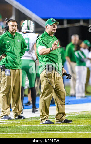 Marshall Head Coach Doc Holliday Walks The Sideline As The Herd Takes 