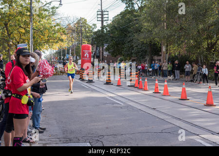 Toronto, Canada. 22nd October, 2017. Canadian marathon runner Aaron Cooper passing the 33km turnaround point at the 2017 Scotiabank Toronto Waterfront Marathon. He achieves the thirteenth place in the race. Credit: YL Images/Alamy Live News Stock Photo