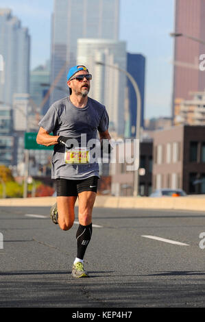 Toronto, Canada. 22nd October 2017. Runners are taking part in the Scotiabank Toronto Waterfront Marathon competition Credit: Anatoliy Cherkasov/Alamy Live News Stock Photo