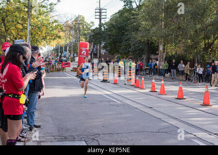 Toronto, Canada. 22nd October, 2017. Canadian marathon runner Matt Suda passing the 33km turnaround point at the 2017 Scotiabank Toronto Waterfront Marathon. He achieves the seventeenth place in the race. Credit: YL Images/Alamy Live News Stock Photo