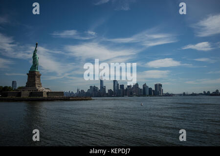 State of Liberty and Lower Manhattan taken from the Hudson River Stock Photo