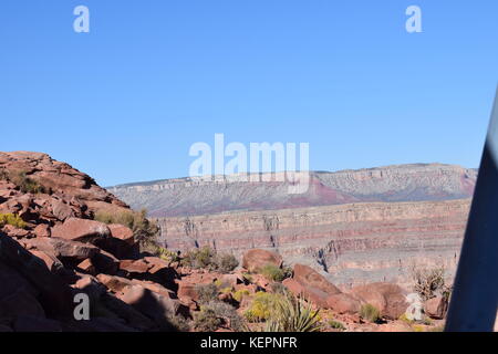 Amazing views from the Grand Canyon Skywalk, a horseshoe-shaped cantilever bridge with a glass walkway suspended 4000 ft above the Grand Canyon. Stock Photo