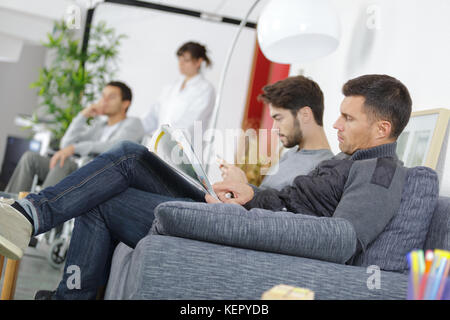 people in a waiting room Stock Photo
