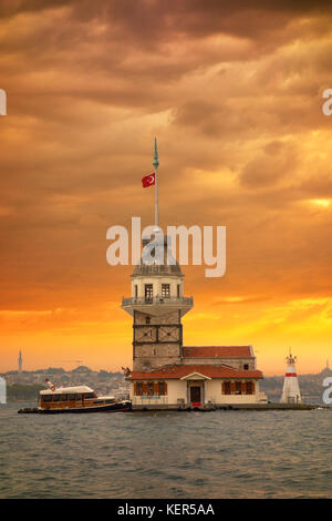 Sunset view on the Bosphorus over the Maiden´s Tower Island and the Golden Horn seen from Uskudar. Istanbul. Turkey Stock Photo