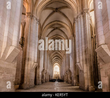 View towards the main chapel and ambulatory of the medieval Alcobaca Monastery, the first truly Gothic building in Portugal Stock Photo