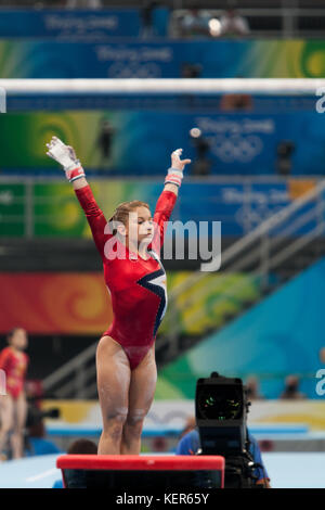 Shawn Johnson (USA) competing on the balance beam in the Women Team ...