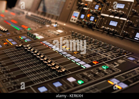 Close up of professional sound mixing console. Selective focus. Stock Photo