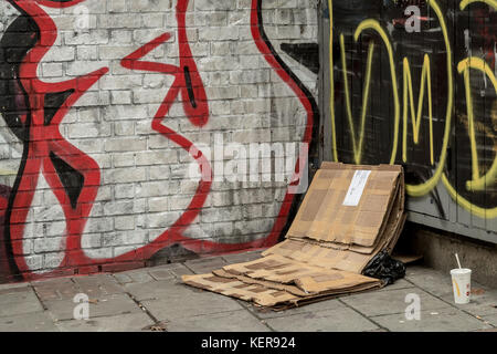 A rough sleeper's cardboard bedding seen near Whitechapel in east London, UK. Stock Photo