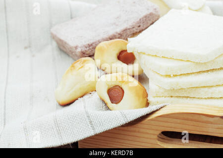Many of breads on a tablecloth. Stock Photo