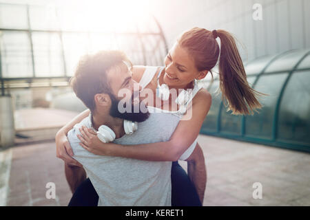 Portrait of young attractive happy fitness couple Stock Photo