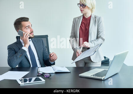 Busy Managers at Work Stock Photo