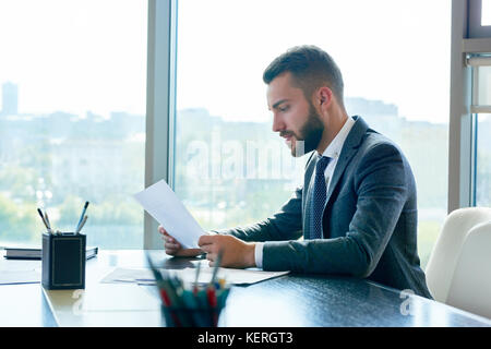 Wrapped up in Paperwork Stock Photo