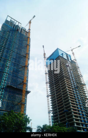 Shenzhen, China: residential buildings under blue sky and white clouds ...