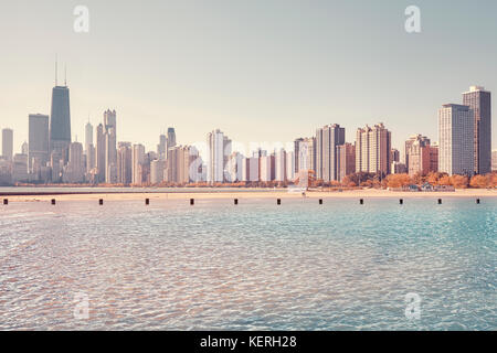 Vintage toned photo of Chicago city skyline seen from Lake Michigan, USA. Stock Photo