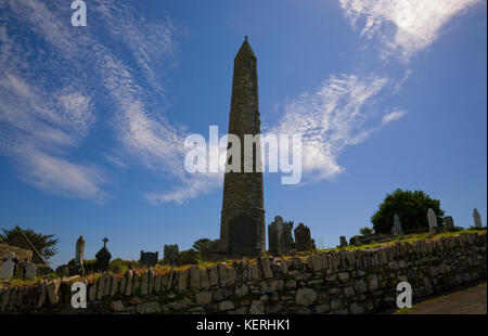5th Century Round Tower, Cathedral of St Declan's 5th Century Monastic Site, Ardmore, County Waterford, Ireland Stock Photo