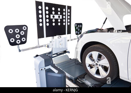 Calibration of the assistant holding camera on the lane on the road isolated Stock Photo