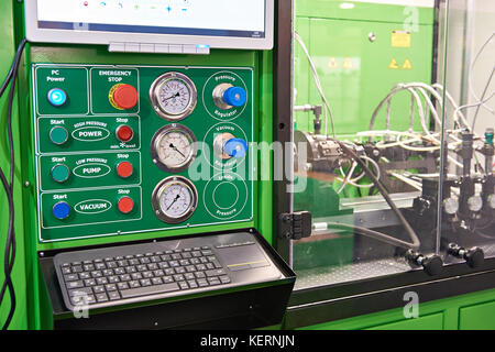 Stand for checking diesel injectors and pumps in a workshop Stock Photo
