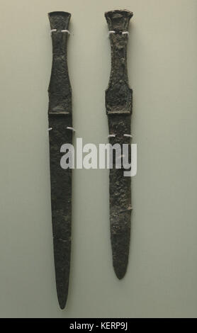 Mesopotamian. Assyrian Empire, Iraq. Two copper alloy swords. From Ur. 1500 BC. British Museum. London. GBR Stock Photo