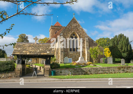 St. Mary's Church and churchyard in Chiddingfold village in Surrey, UK Stock Photo