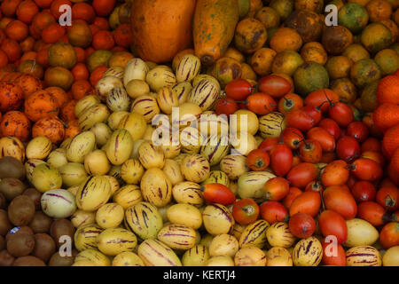 Colorful fruit for sale at an outdoor food market in Otavalo, Ecuador Stock Photo