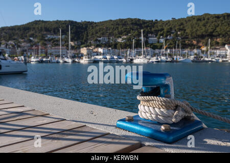 Closeup of a bollard with ropes in the port of Estartit on the Costa Brava Stock Photo