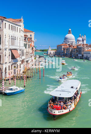 Venice italy venice Vaporettos actv water taxi or water bus and small motor boats Venice Grand Canal near santa maria della salute church Venice Italy