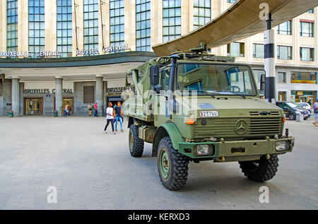 Brussels, Belgium. Army truck parked outside Brussels Central train station: Mercedes Benz Unimog 4x4 Light Utility Truck Stock Photo