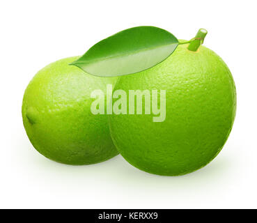 Whole fresh lime fruit with green leaf next to lime lying on its side isolated on white background Stock Photo