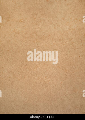 Smooth tan  brown mottled cardboard background Stock Photo