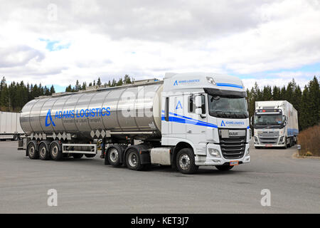 HIRVASKANGAS, FINLAND - MAY 20, 2017: White DAF XF 460 semi tanker of Adams Logistics exits truck stop yard in Central Finland. Stock Photo