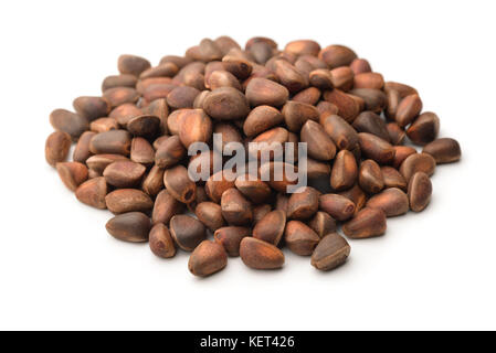 Pile of pine nuts isolated on white Stock Photo