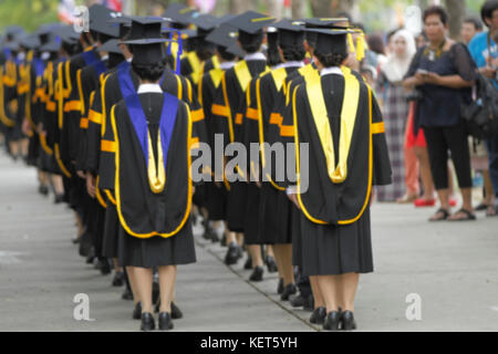 blurry of Graduates are walking the line to get a diploma and selective focus. Stock Photo