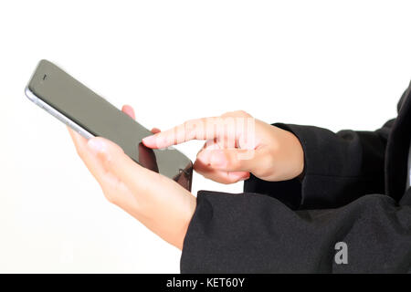 Businessmen and women are using mobile and  touch smart phone  for Communication and checking Stock Photo