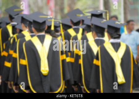 blurry of Graduates are walking the line to get a diploma Stock Photo