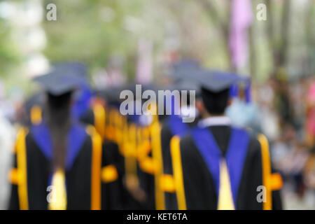 blurry of Graduates are walking the line to get a diploma Stock Photo