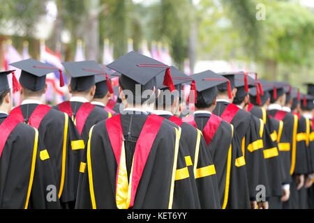 soft focus and blurry of Graduates are walking the line to get a diploma Stock Photo