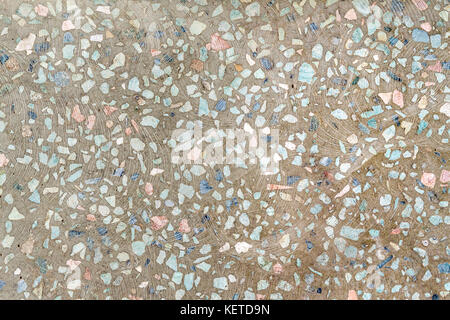 Background of concrete with colourful stones in it Stock Photo