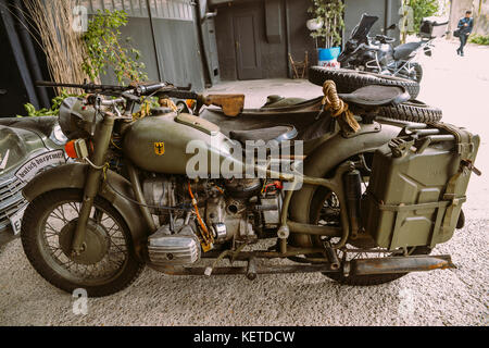 This BMW R75 is a World War II-era motorcycle and sidecar combination manufactured by the German company Bavarian Motor Works. Stock Photo