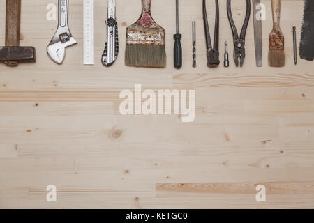 Set of different tools on wooden background Stock Photo