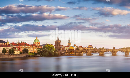 View of the Vltava River and the bridges shined with the sunset sun, Prague, the Czech Republic Stock Photo